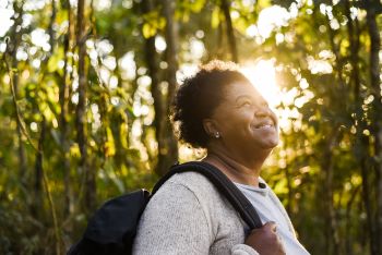 Woman hiking in the woods